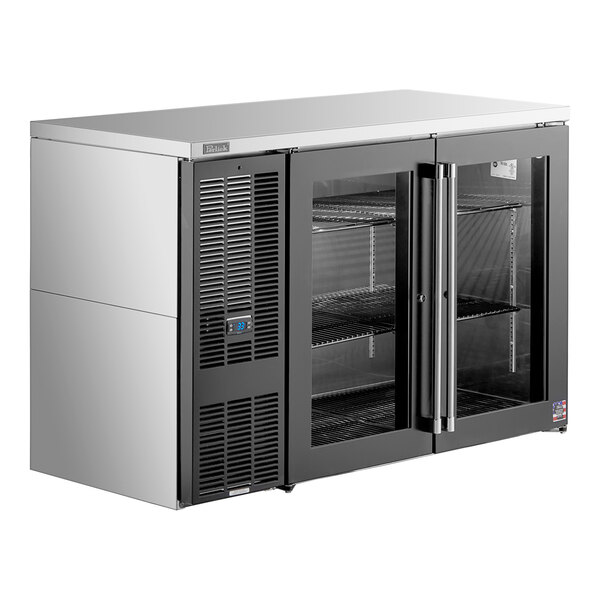 A stainless steel Perlick back bar refrigerator with two glass doors.