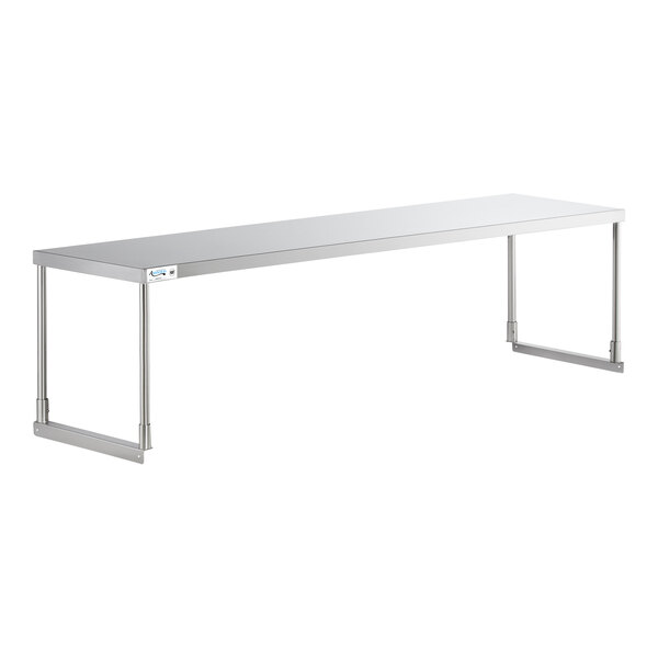 A stainless steel Avantco single deck overshelf on a long metal table.