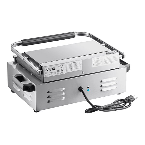 A silver Avantco commercial panini grill with black handles and a cord attached.