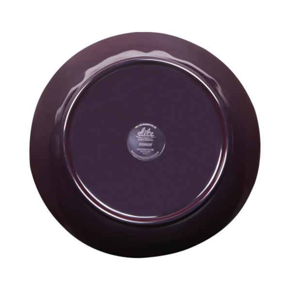An irregular round purple melamine bowl with a black rim.
