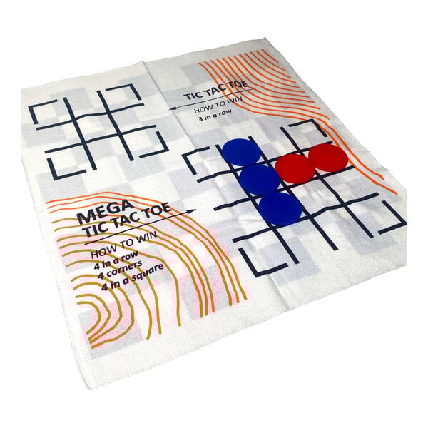 A white towel with blue and red circles on it.