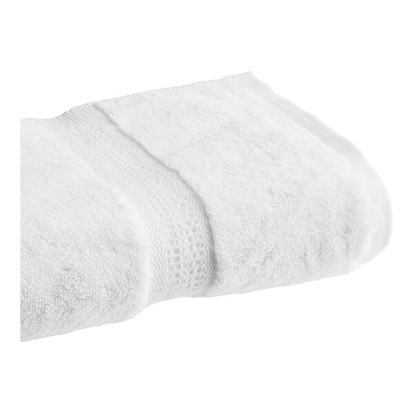 A 1888 Mills Oasis white bath towel.