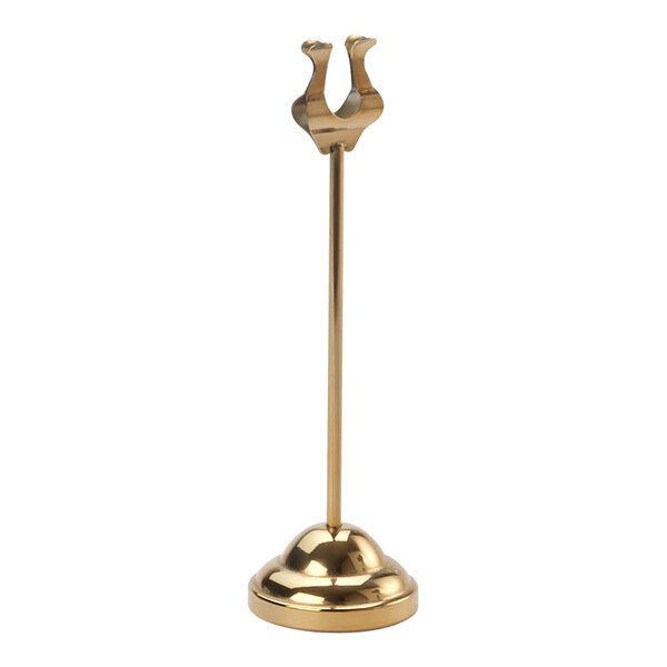 An American Metalcraft gold metal harp-style number stand.