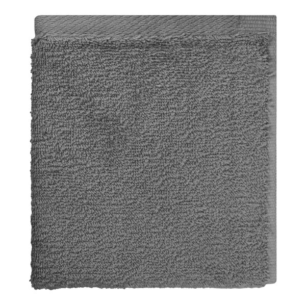 A close-up of a grey 1888 Mills Millenium washcloth.
