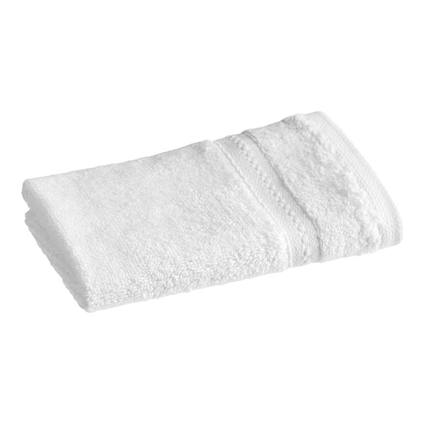 A close-up of a white 1888 Mills Pure Terry washcloth.