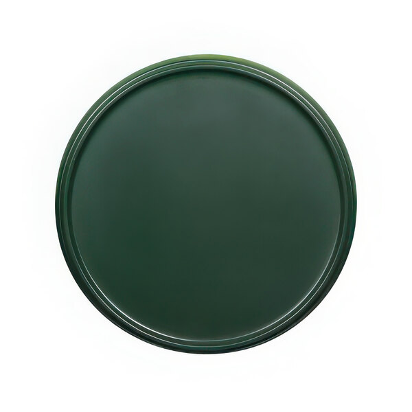 A green melamine plate with a white circle around it.