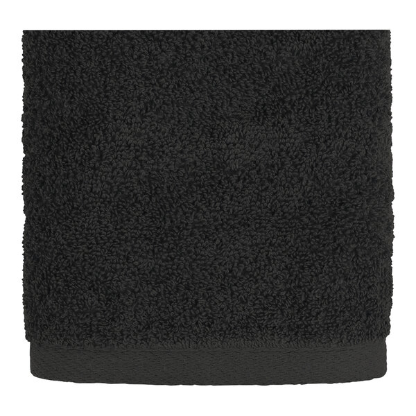 An Onyx 1888 Mills hand towel with a white border.