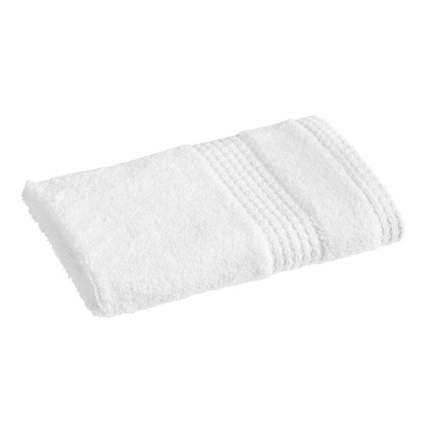 A 1888 Mills white washcloth with a white border.