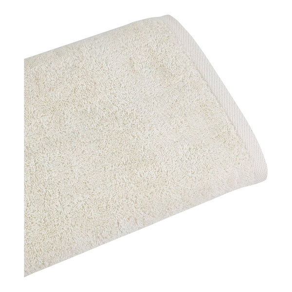 A white 1888 Mills bath sheet with a white edge.