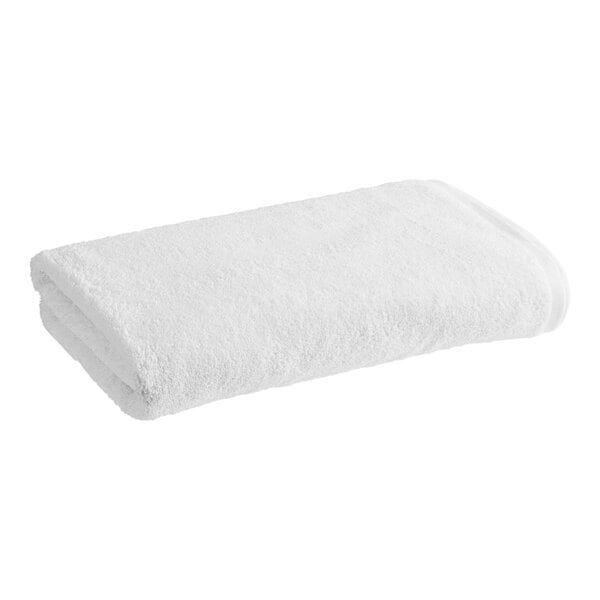 A white folded 1888 Mills True Comfort bath towel.