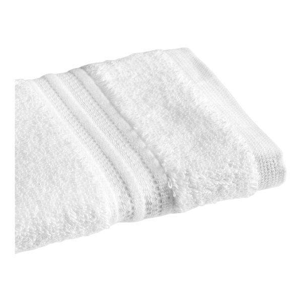 A white 1888 Mills Sweet South washcloth with a white stripe.