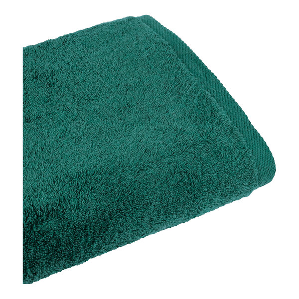 A close up of a green 1888 Mills Millennium bath towel.