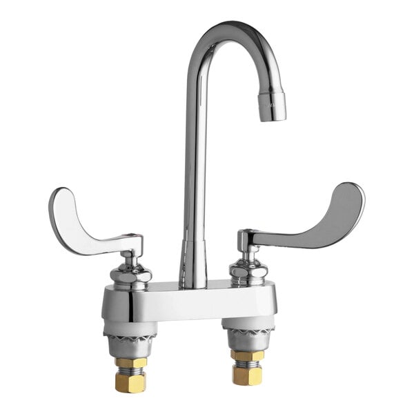A chrome Chicago Faucets deck-mounted faucet with 4" wristblade handles and a rigid gooseneck spout.
