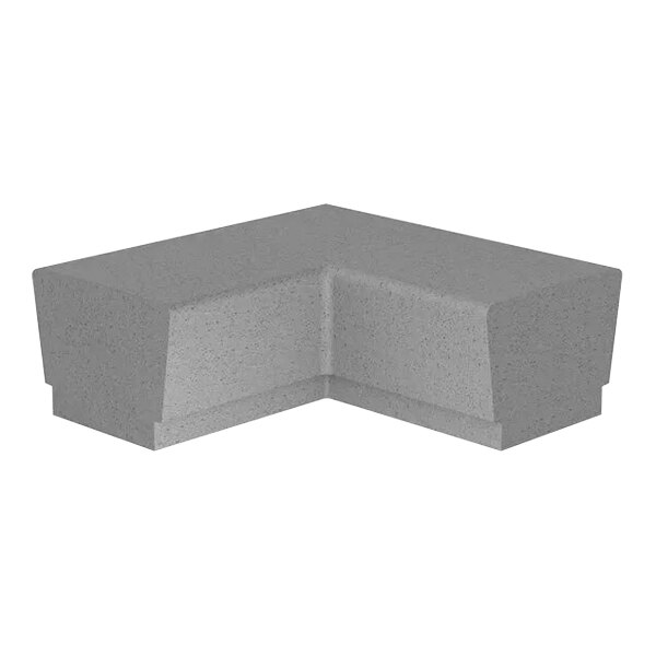 A grey concrete corner with a grey base.