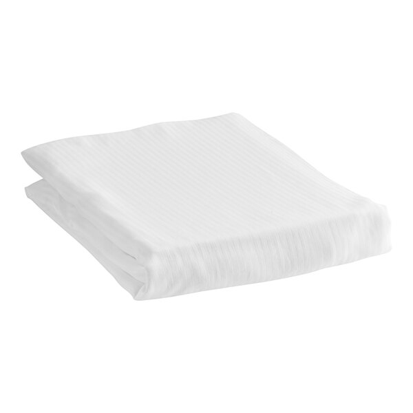 A folded white Magnificence fitted sheet.