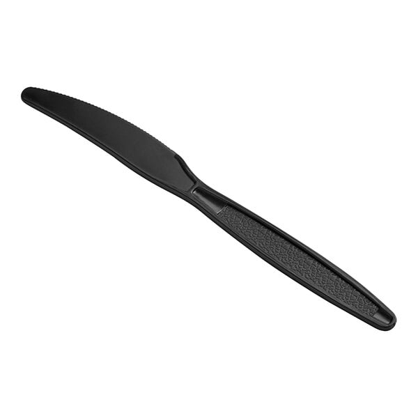 A black plastic knife with a black handle.