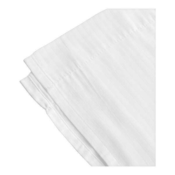 A folded white Magnificence T-310 sheet with tone on tone stripes.