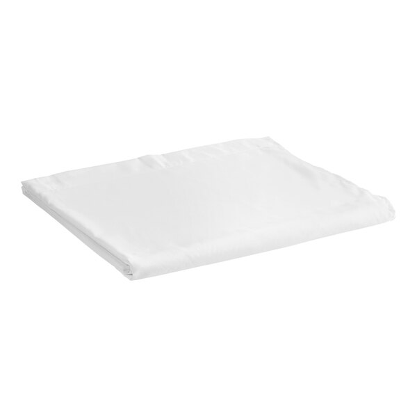 A white folded blanket on a white background.