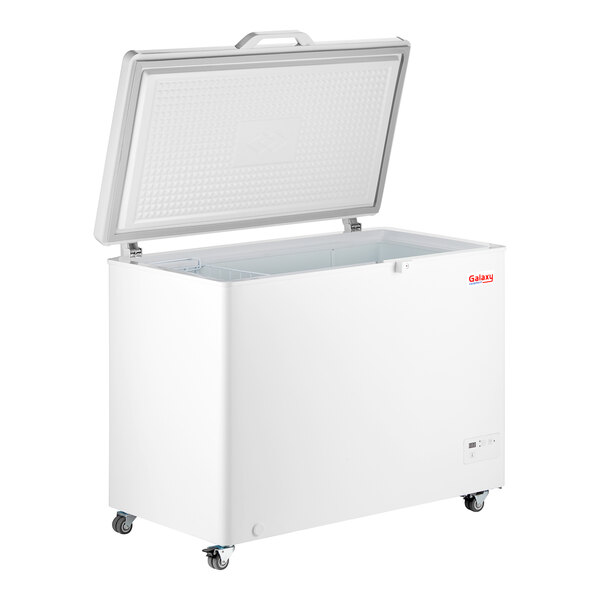 A white Galaxy Ultra Cold chest freezer with a lid on wheels.