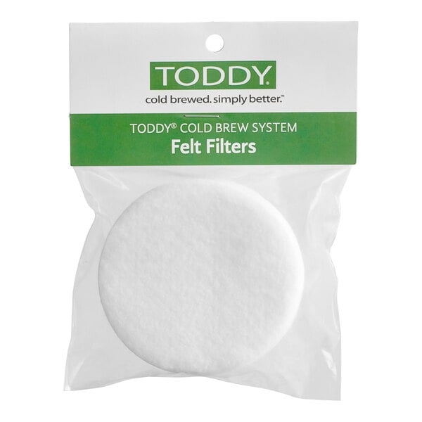 Two white round Toddy felt filters in a package.