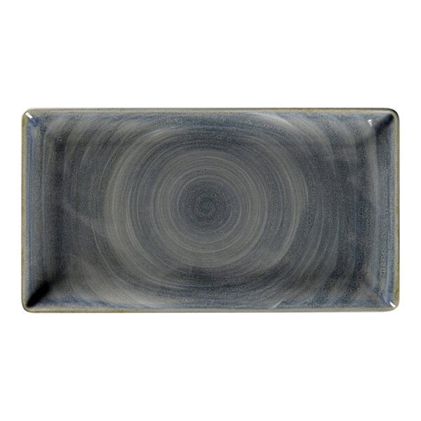 A close-up of a RAK Porcelain jade rectangular plate with a spiral pattern.