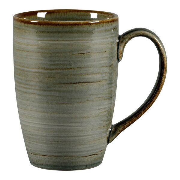 A peridot RAK Porcelain mug with a brown handle.