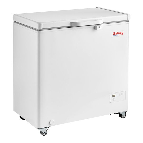 A white rectangular Galaxy Ultra Cold chest freezer on wheels.