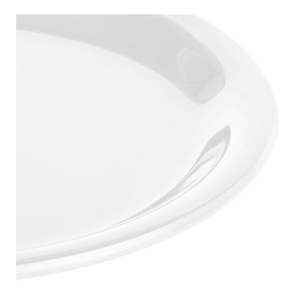 A close-up of a white Carlisle Sierrus melamine pie plate with a narrow rim.