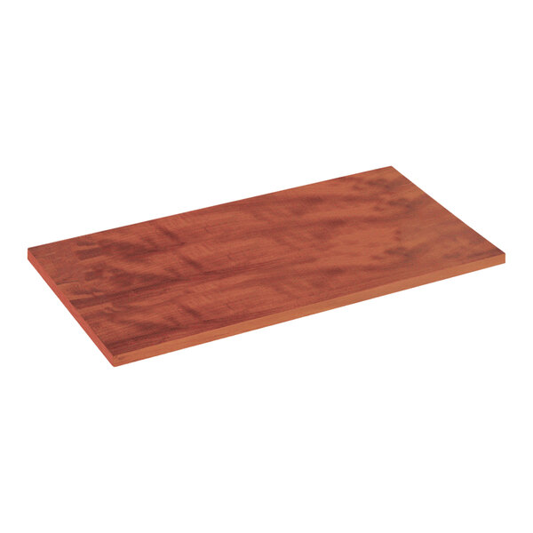 A 23 3/4" x 10" cherry laminated wood shelf on a wooden surface.