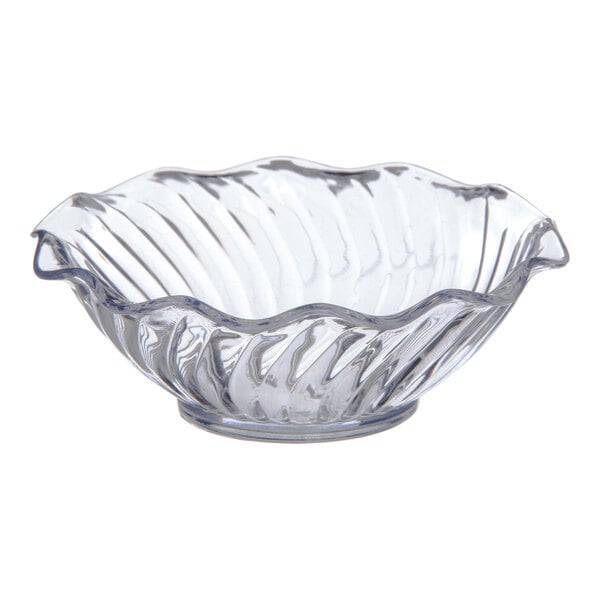 A clear plastic bowl with a wavy edge.