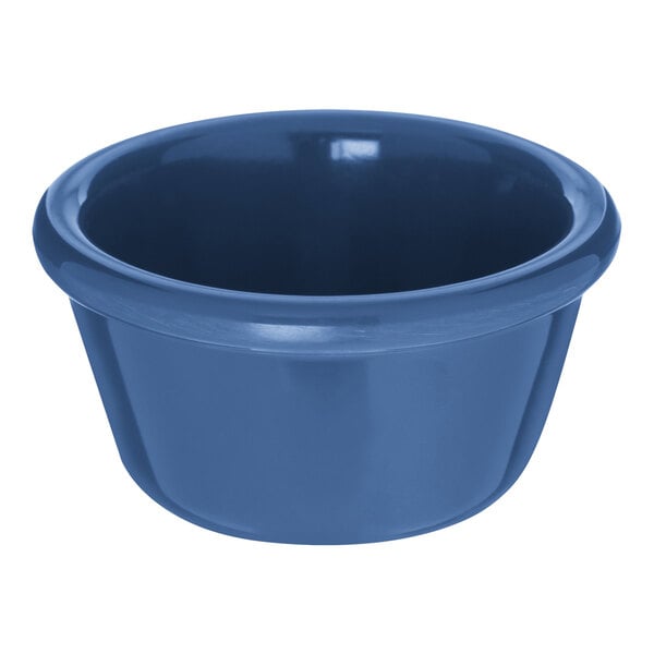 A Carlisle ocean blue melamine ramekin.
