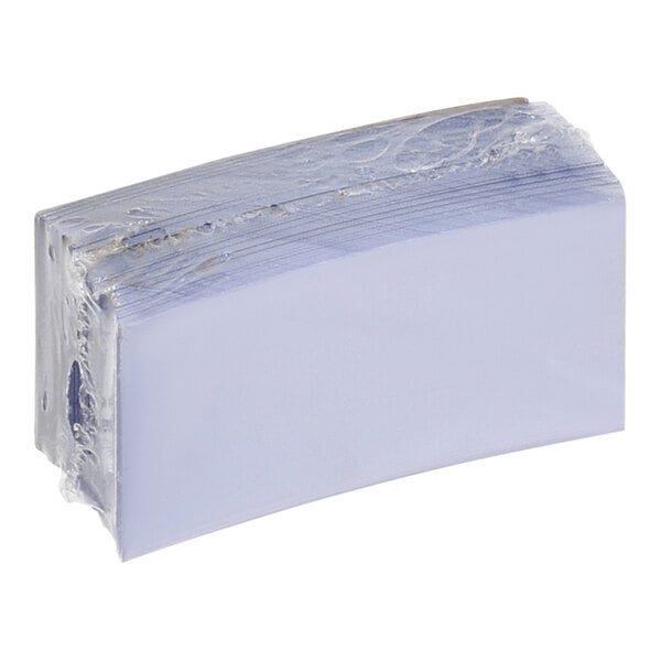 A stack of white paper with blue packaging strips.