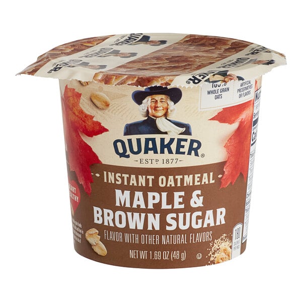 A Quaker Maple and Brown Sugar instant oatmeal cup on a table.