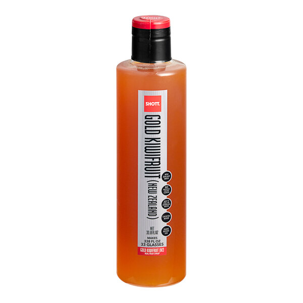 A bottle of SHOTT Gold Kiwifruit syrup with a red cap and label.