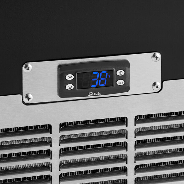 A digital display on a Perlick black horizontal bottle cooler.