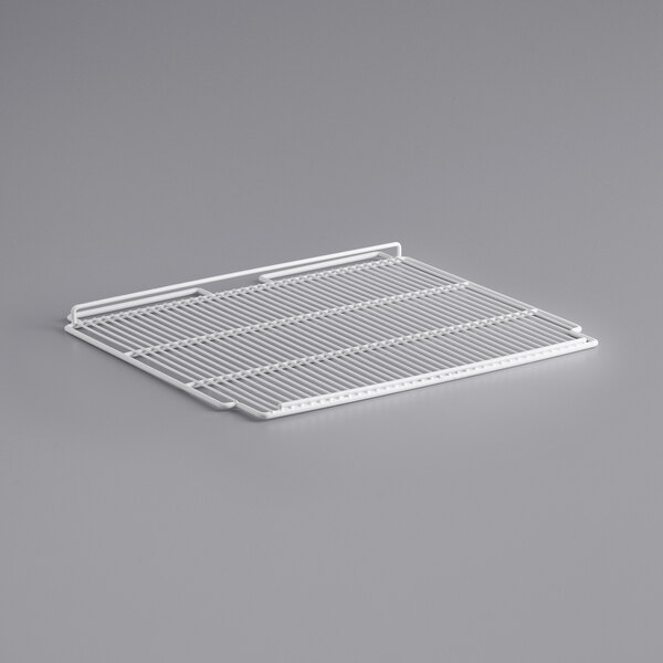 A white wire rack on a gray background.