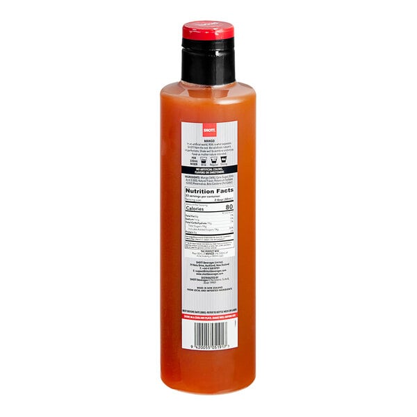 A bottle of SHOTT Mango Real Fruit Flavoring Syrup with a label on it.