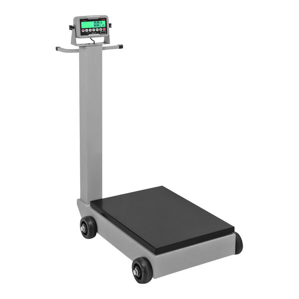 A grey Cardinal Detecto floor scale with a Tower display.