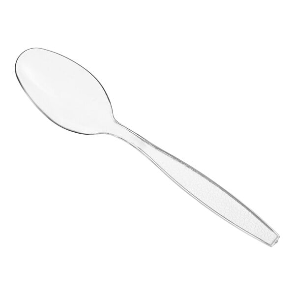A clear heavy weight polystyrene plastic teaspoon.