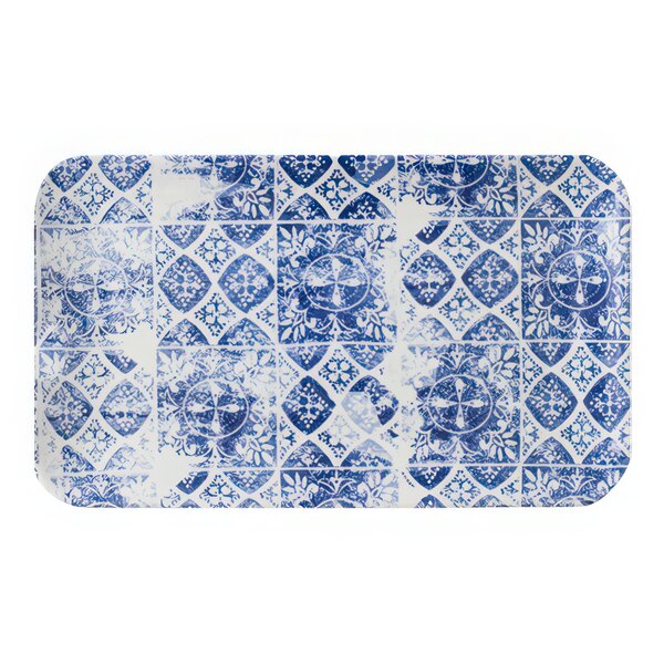 A white rectangular china tray with a blue and white pattern.