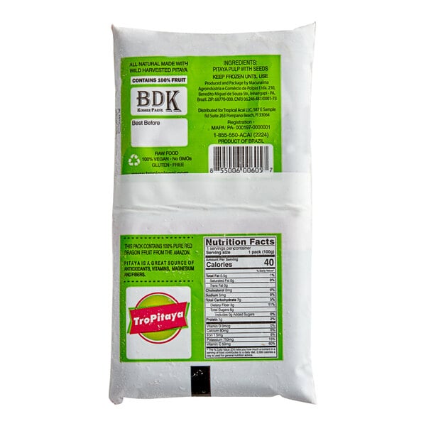 A white Tropical Acai Pitaya Dragon Fruit Blender package with green labels.