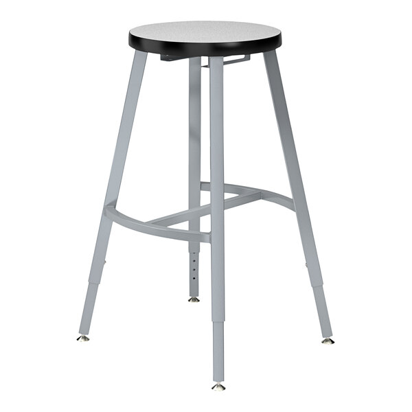 A National Public Seating Titan lab stool with a gray seat and metal legs.