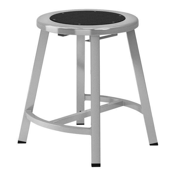 A National Public Seating Titan round metal lab stool with black seat.