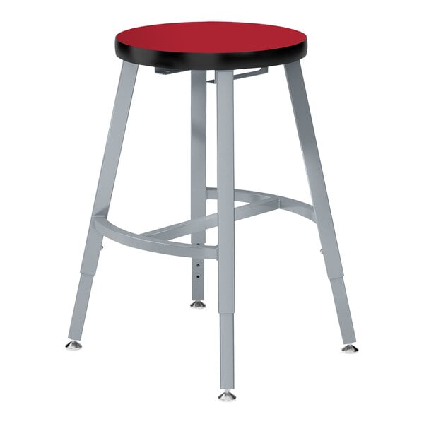 A gray National Public Seating lab stool with a hollyberry seat and black steel legs.