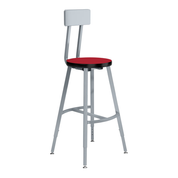 A National Public Seating gray and hollyberry lab stool with a metal frame and red seat.