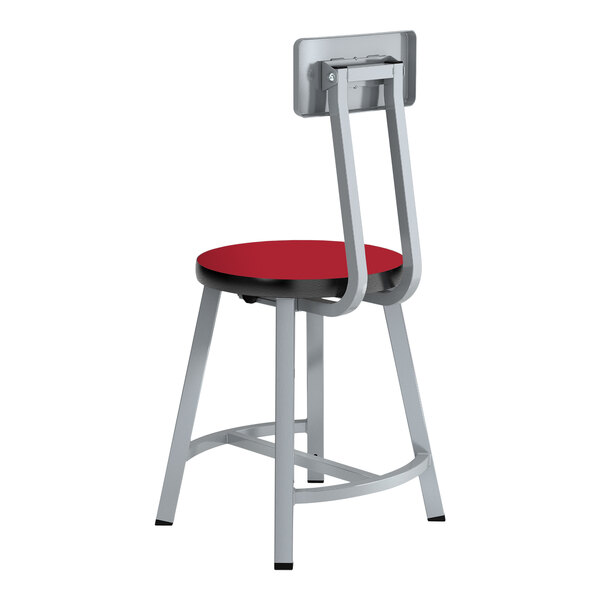 A National Public Seating Titan lab stool with a hollyberry red high-pressure laminate seat and back.