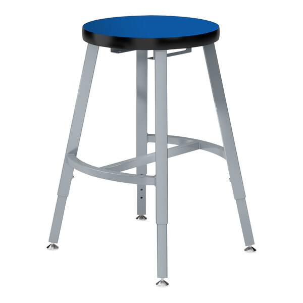 A gray steel and blue laminate National Public Seating lab stool with adjustable legs.