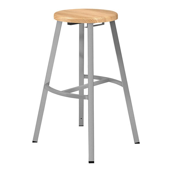 A National Public Seating Titan lab stool with a wooden seat and metal legs.