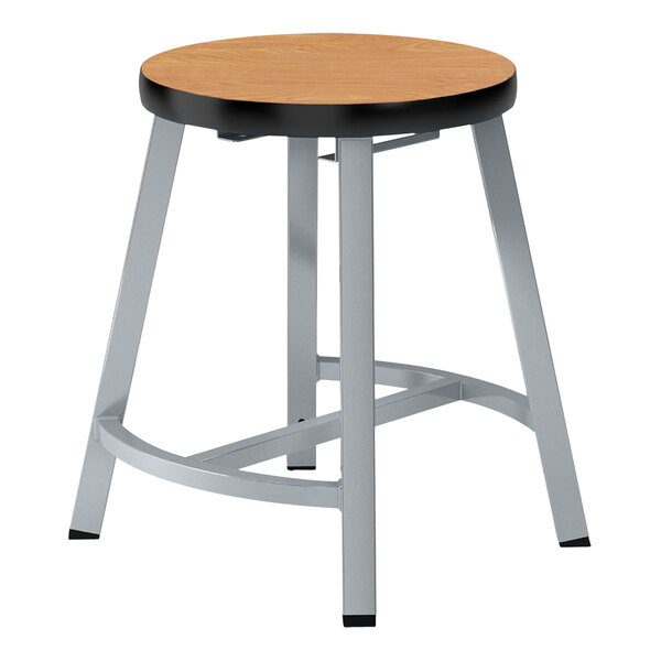 A National Public Seating Titan lab stool with a Bannister Oak high-pressure laminate seat.