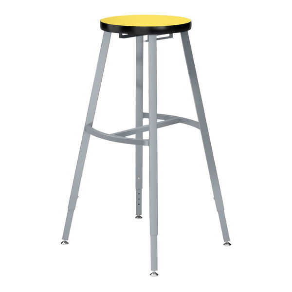 A National Public Seating lab stool with a marigold seat.